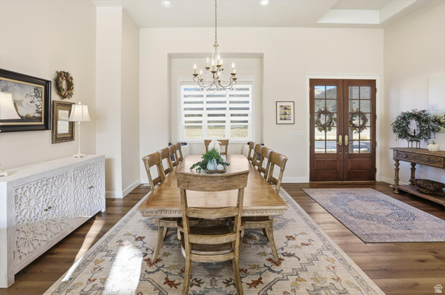 534 East Fish Hatchery Road Mantua, UT 84324 - Photo 14 of 87 Dining area featuring french doors, plenty of natural light, and dark wood-type flooring