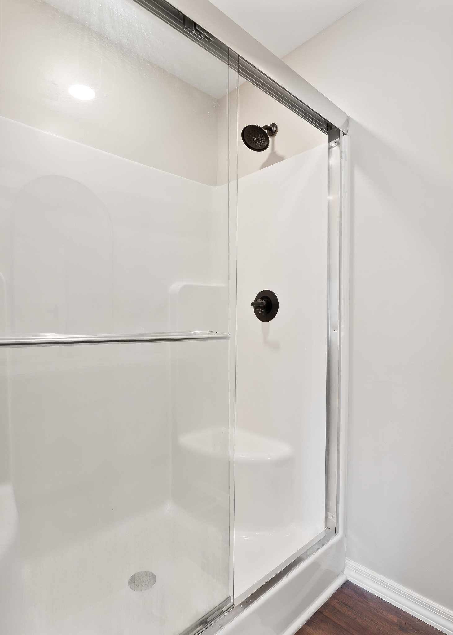 936 North Spring Street Sparta, TN 38583 - Photo 15 of 31 a bathroom with a glass shower door