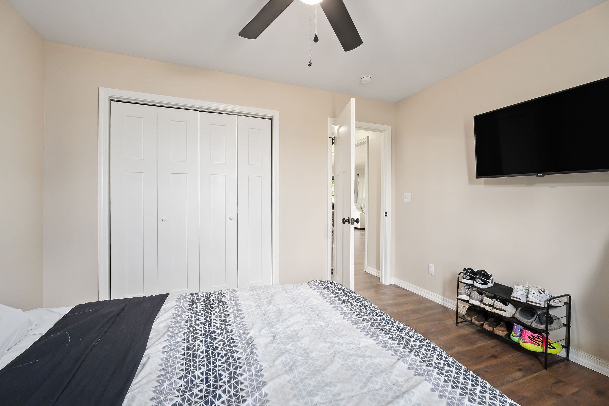 936 North Spring Street Sparta, TN 38583 - Photo 22 of 31 a bedroom with a bed and a flat screen tv