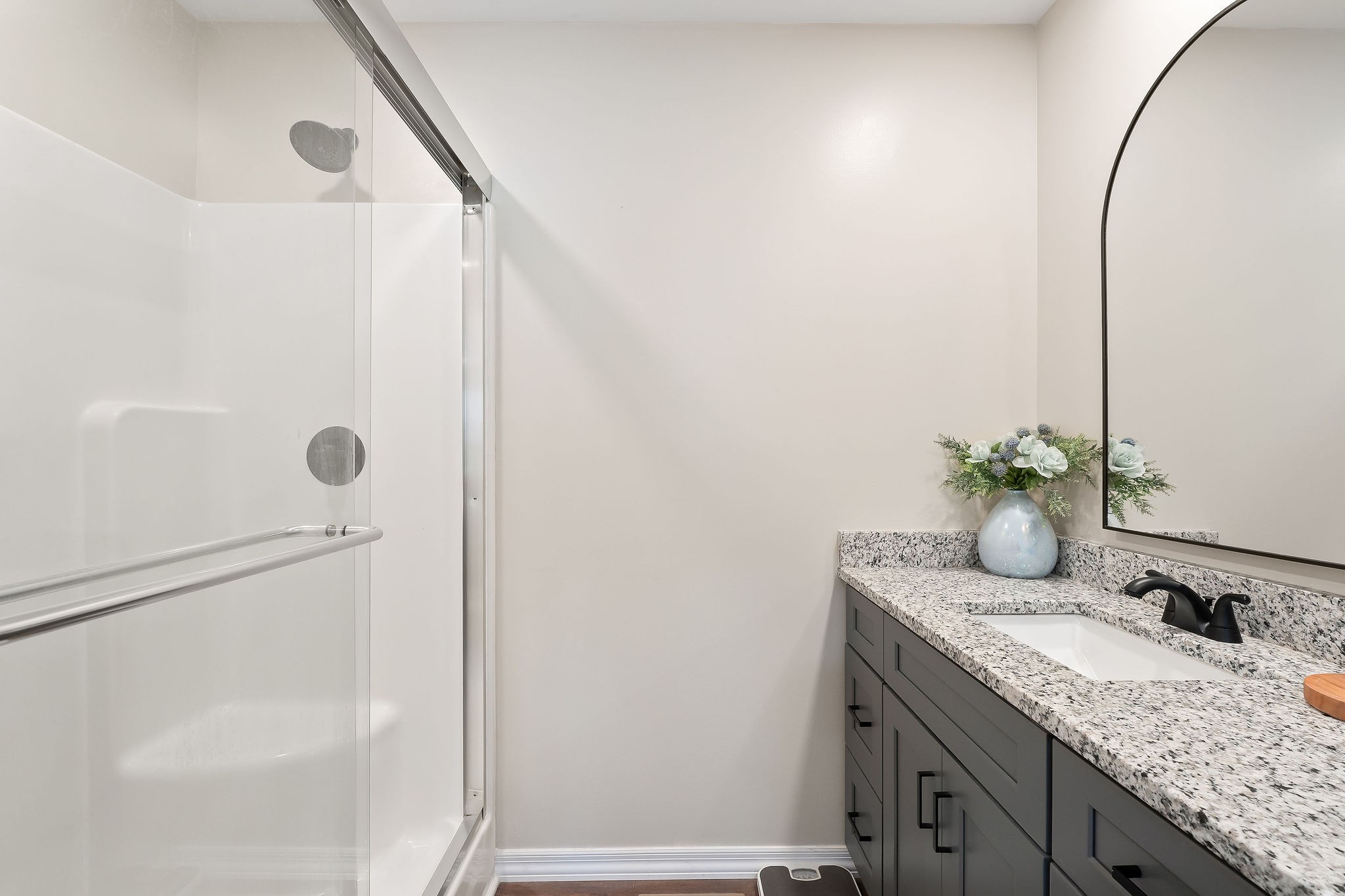 936 North Spring Street Sparta, TN 38583 - Photo 24 of 31 a bathroom with a granite countertop sink and a mirror