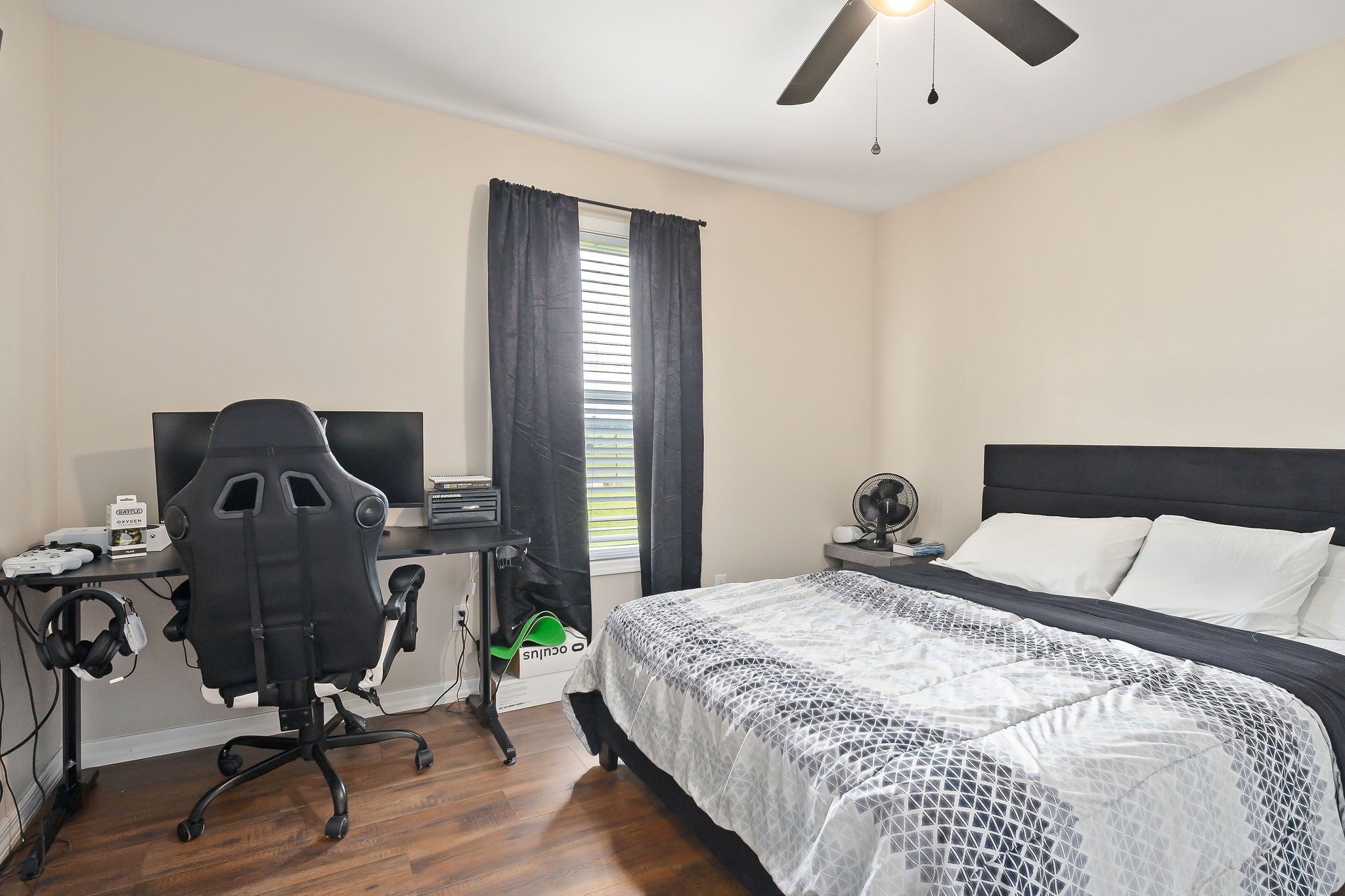 936 North Spring Street Sparta, TN 38583 - Photo 25 of 31 a bedroom with a bed and wooden floor