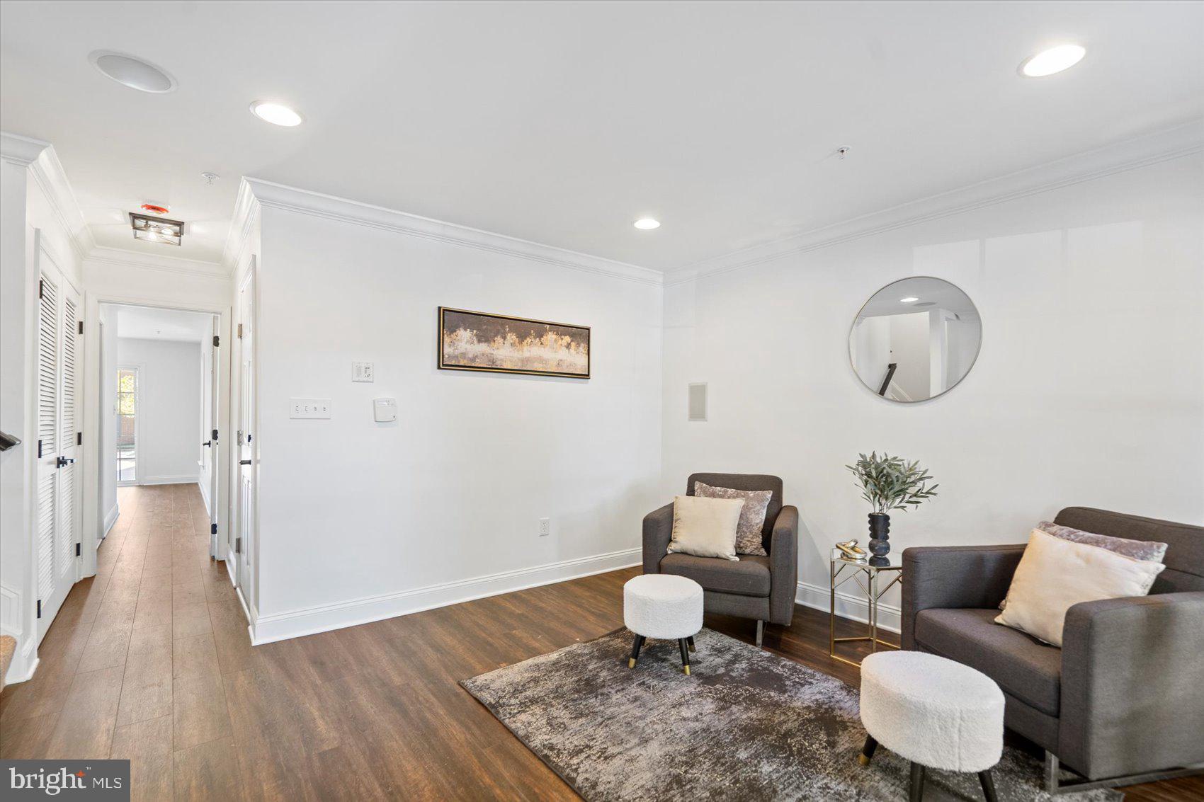 829 McHenry Street Baltimore, MD 21230 - Photo 14 of 41 a living room with furniture and a wooden floor