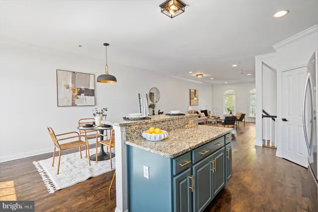 a view of a house with wooden deck