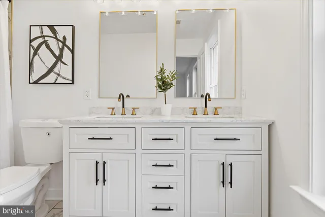 a bathroom with a shower and a mirror