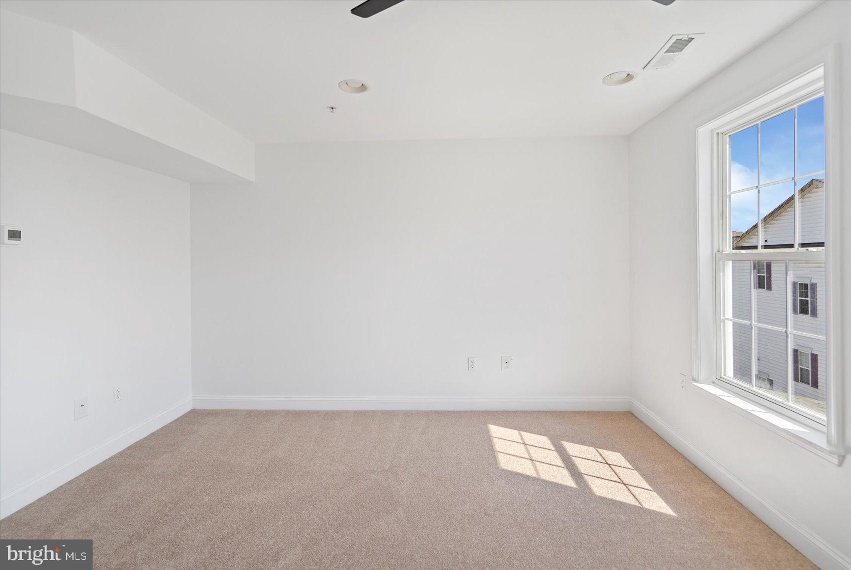 829 McHenry Street Baltimore, MD 21230 - Photo 33 of 41 a view of an empty room with a window