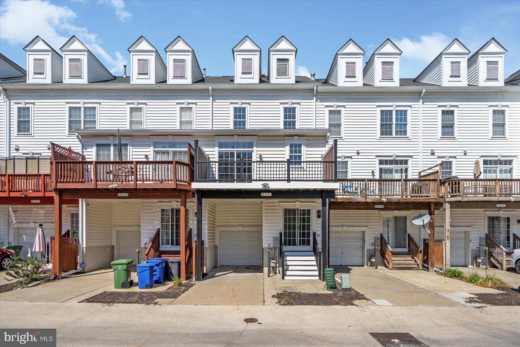 829 McHenry Street Baltimore, MD 21230 - Photo 5 of 41 a front view of a building with many windows