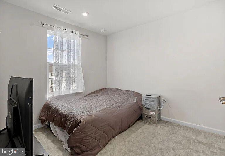 31 Continental Boulevard Sicklerville, NJ 08081 - Photo 25 of 29 a bedroom with a bed and a window