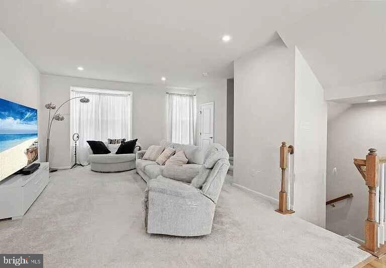 31 Continental Boulevard Sicklerville, NJ 08081 - Photo 10 of 29 a living room with furniture and a large window