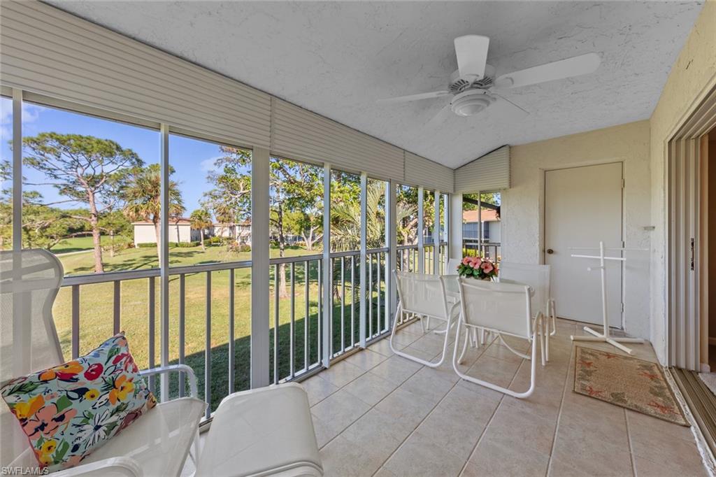 273 Albi Road, Unit 4 Naples, FL 34112 - Photo 19 of 50 Lanai with ceiling fan and vaulted ceiling