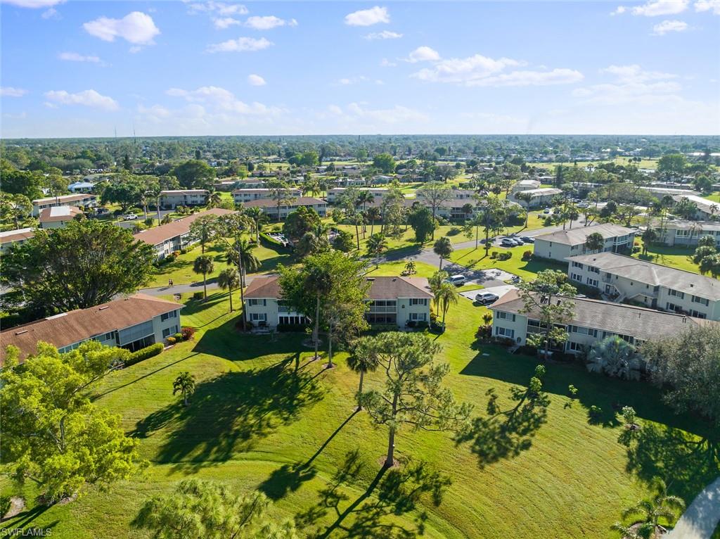 273 Albi Road, Unit 4 Naples, FL 34112 - Photo 38 of 50 Drone / aerial view