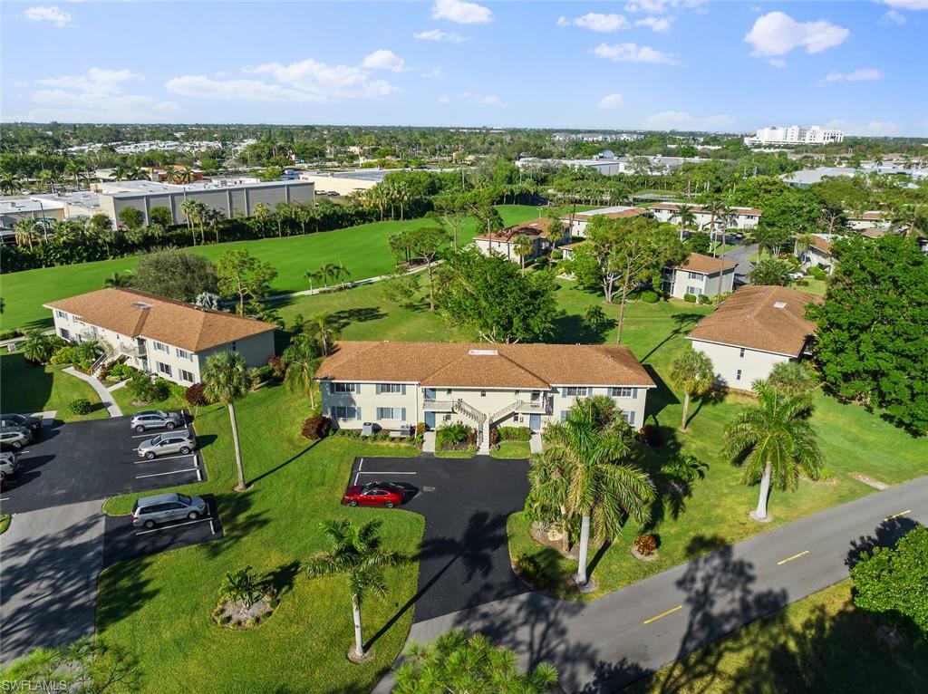 273 Albi Road, Unit 4 Naples, FL 34112 - Photo 43 of 50 Drone / aerial view