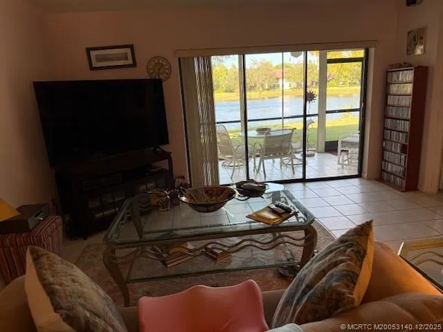 a room with furniture and a flat screen tv