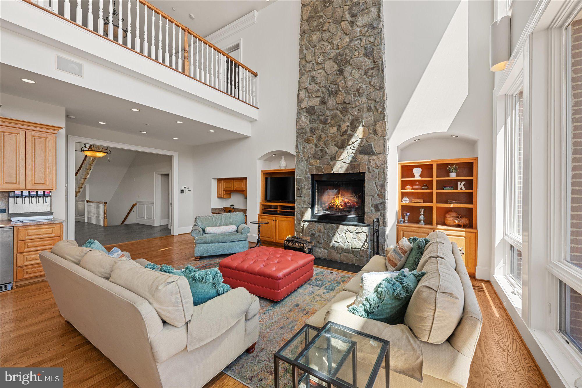 1701 South Arlington Ridge Road Arlington, VA 22202 - Photo 14 of 90 Two-story stone wood burning fireplace