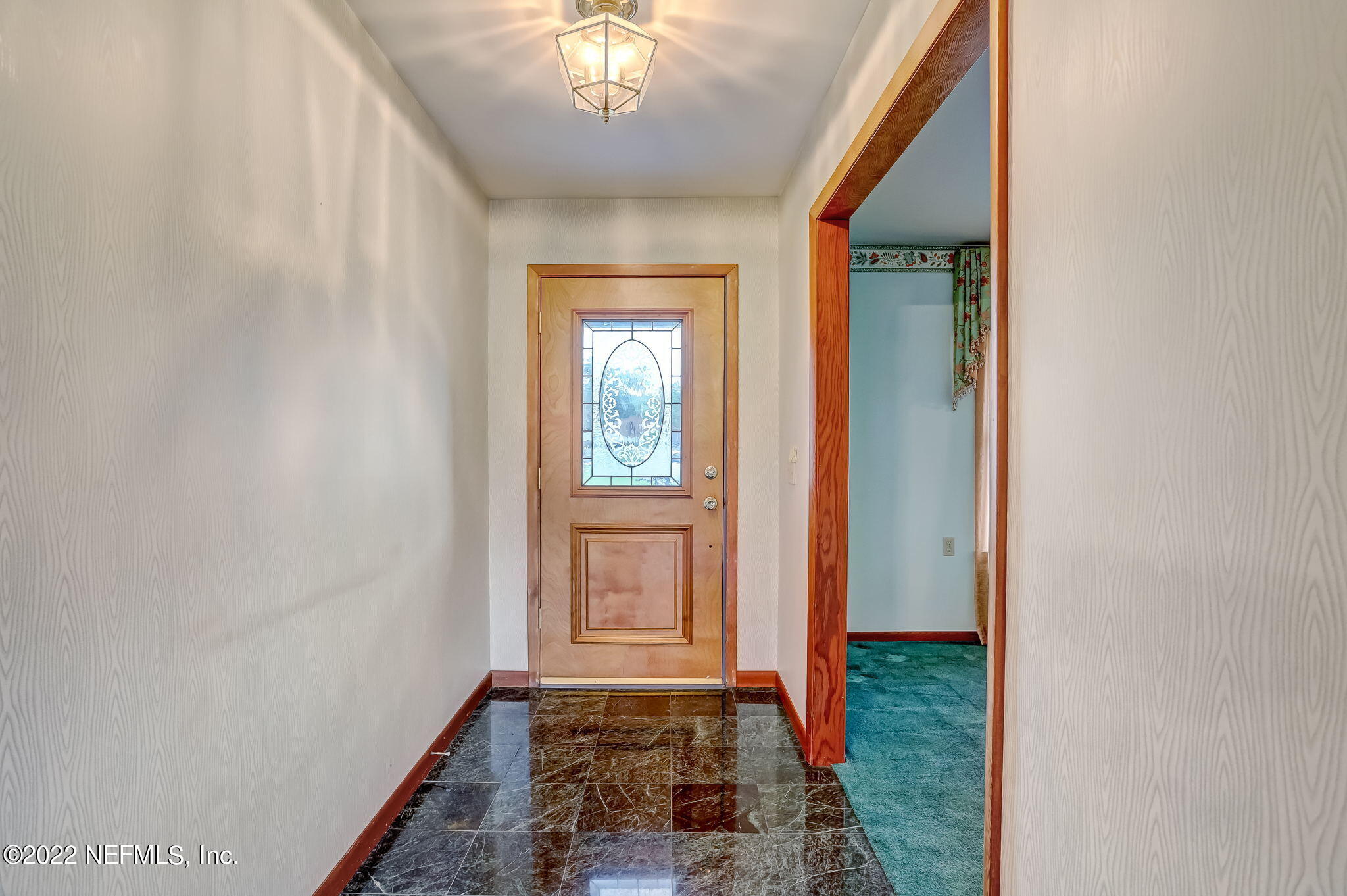 11643 Olde Mandarin Road Jacksonville, FL 32223 - Photo 14 of 70 a view of an entryway of a house