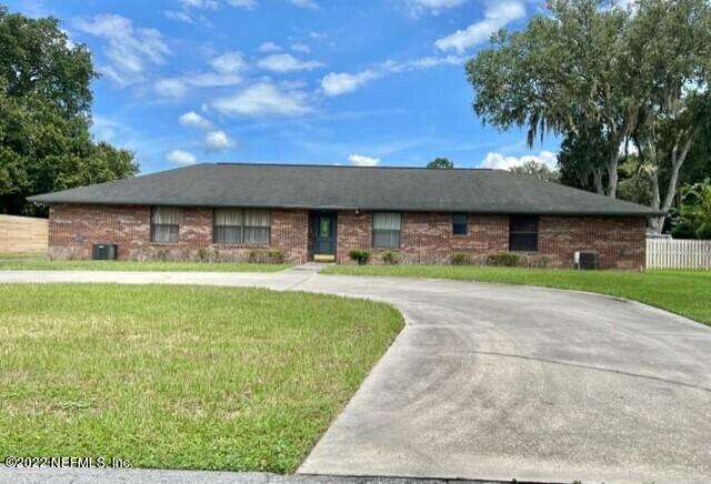 11643 Olde Mandarin Road Jacksonville, FL 32223 - Photo 2 of 70 a front view of house with yard and outdoor seating
