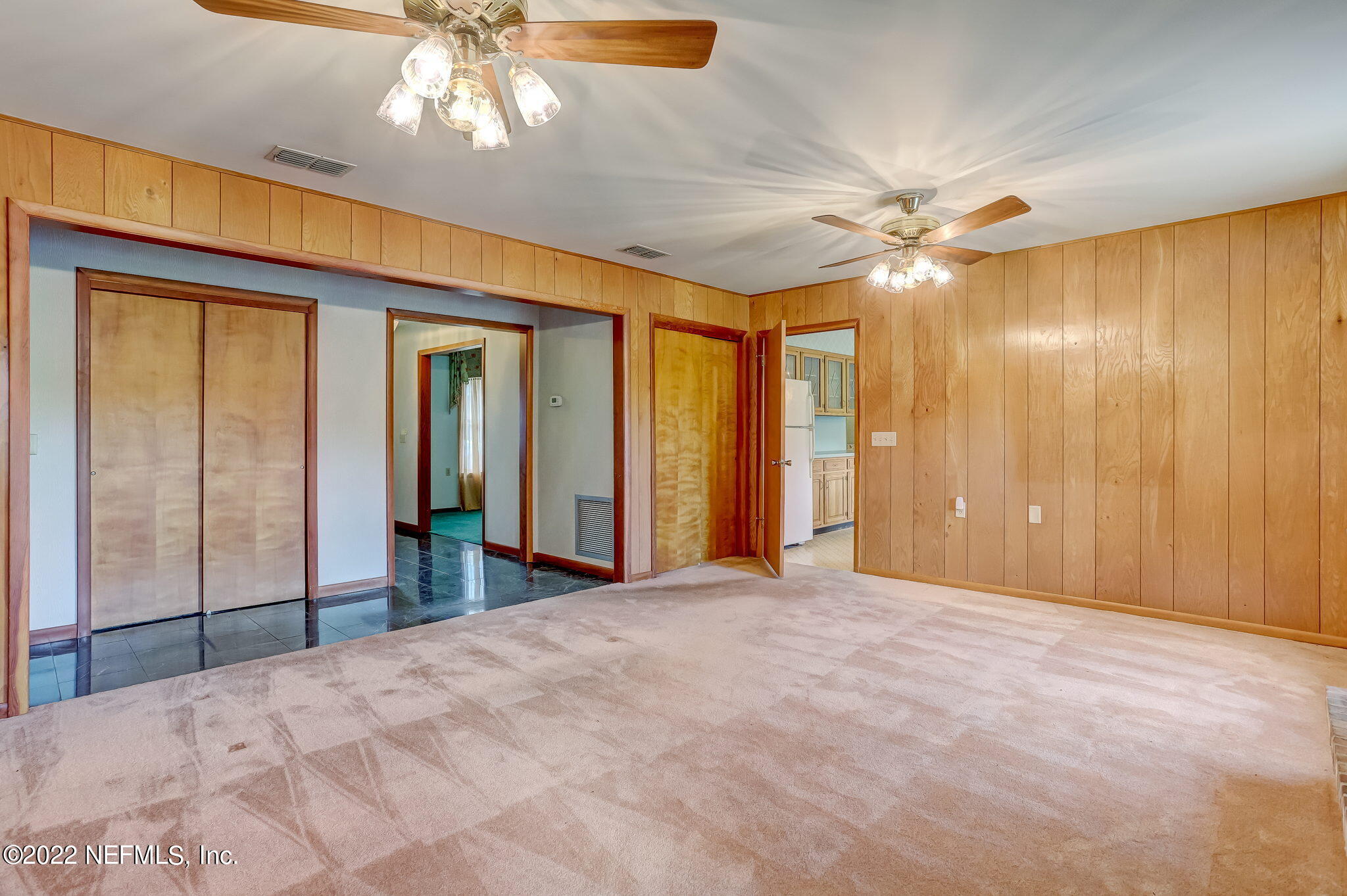11643 Olde Mandarin Road Jacksonville, FL 32223 - Photo 24 of 70 a view of a livingroom with a chandelier fan