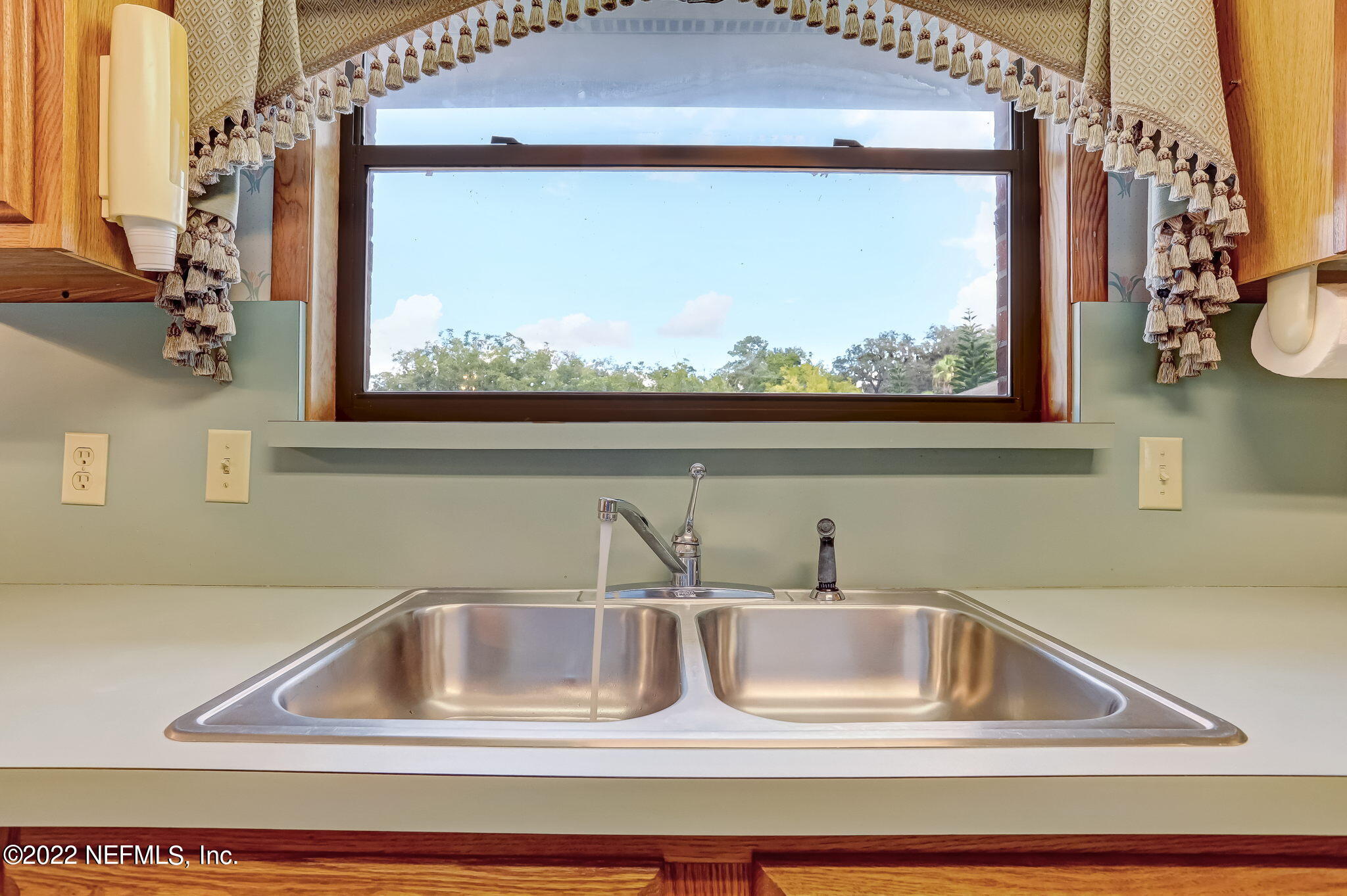 11643 Olde Mandarin Road Jacksonville, FL 32223 - Photo 34 of 70 a close view of sink and tap