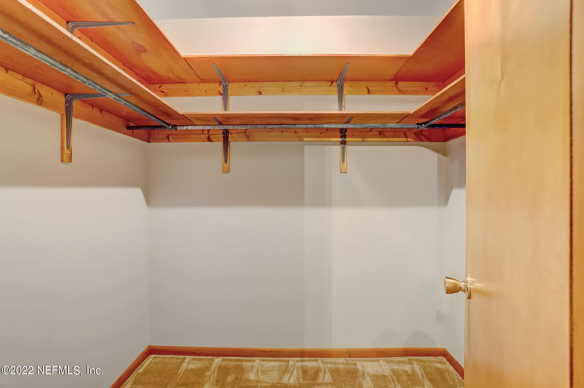 11643 Olde Mandarin Road Jacksonville, FL 32223 - Photo 52 of 70 a view of walk in closet