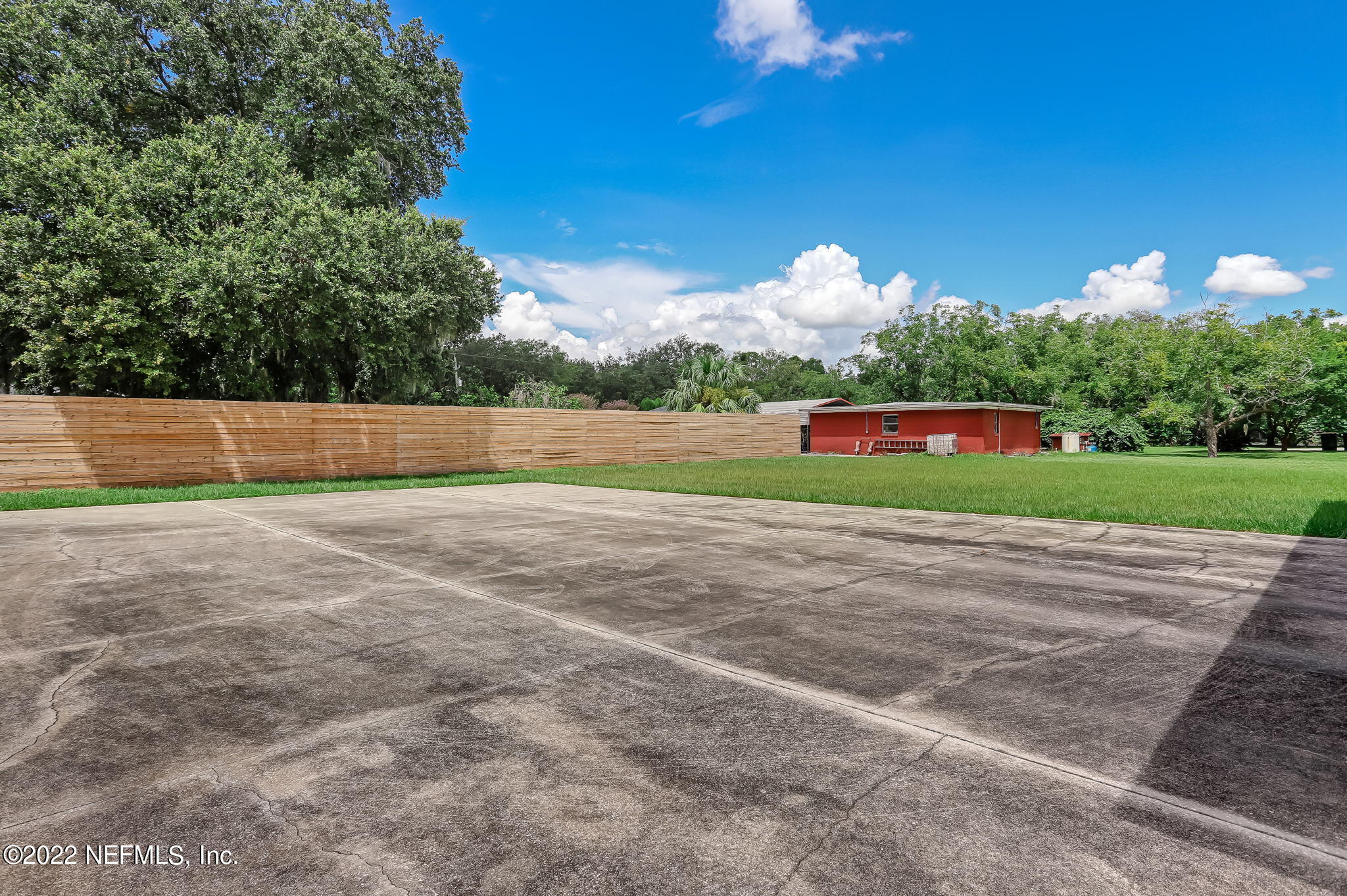 11643 Olde Mandarin Road Jacksonville, FL 32223 - Photo 63 of 70 a view of an outdoor space and a yard