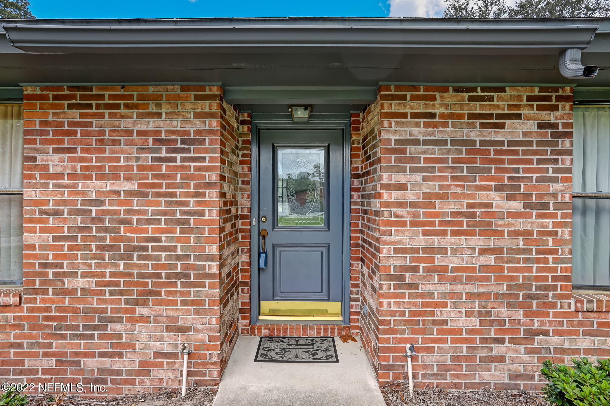 11643 Olde Mandarin Road Jacksonville, FL 32223 - Photo 10 of 70 a view of a door and a window
