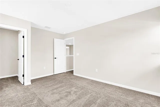 an aerial view of a house with swimming pool
