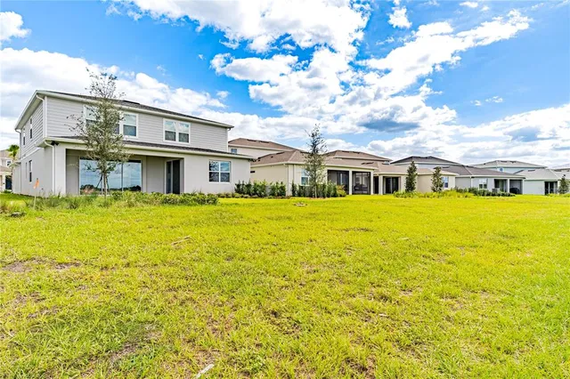a view of a swimming pool with a lake view