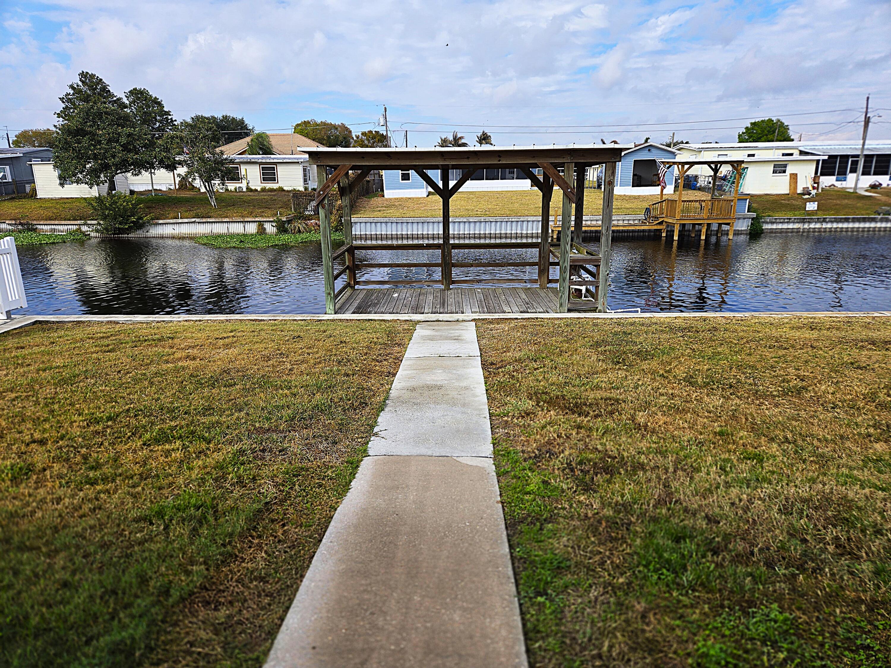 2425 Southeast 31st Street Okeechobee, FL 34974 - Photo 33 of 43 a view of swimming pool with outdoor seating