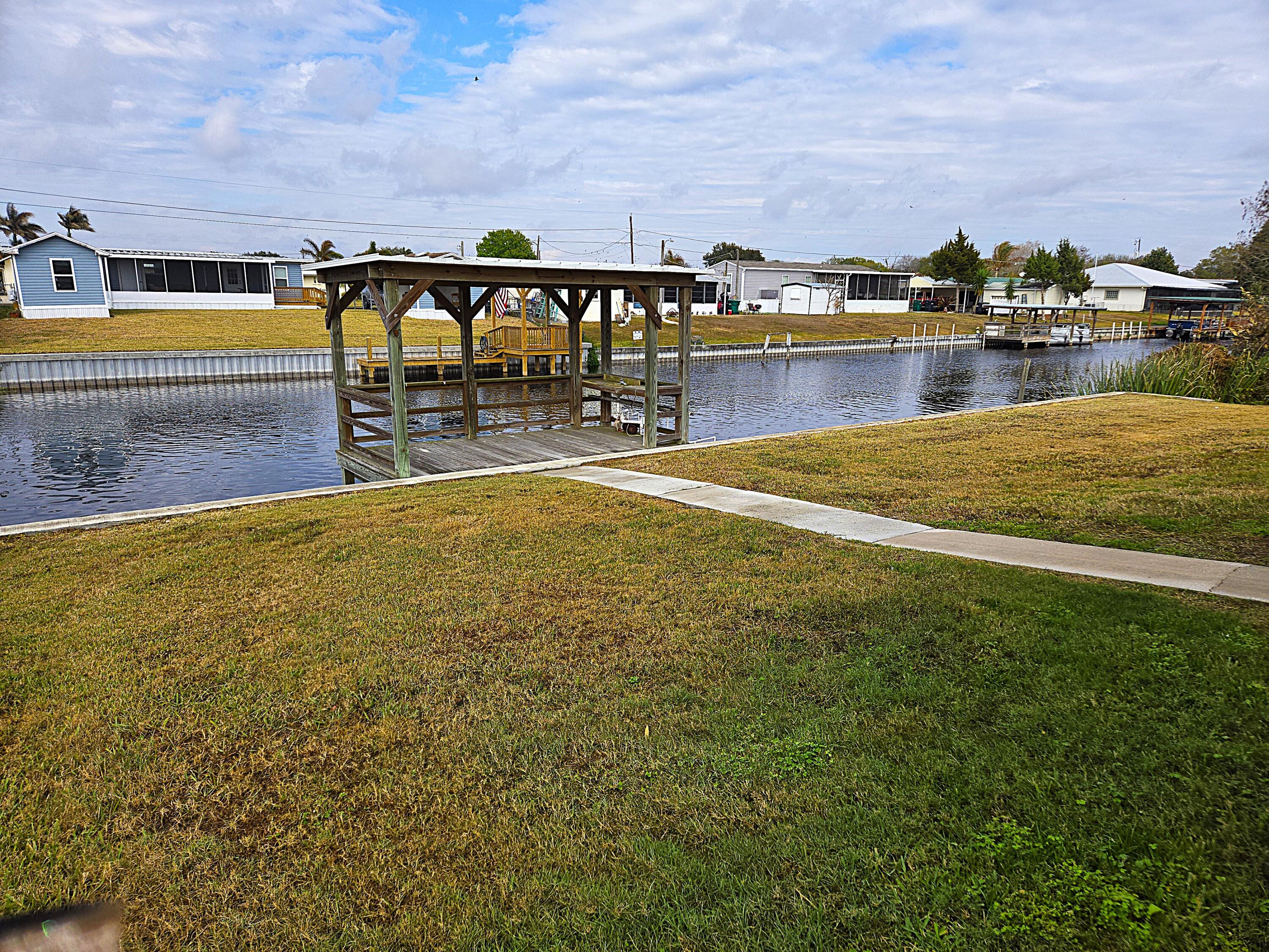 2425 Southeast 31st Street Okeechobee, FL 34974 - Photo 34 of 43 a view of a swimming pool with an ocean view