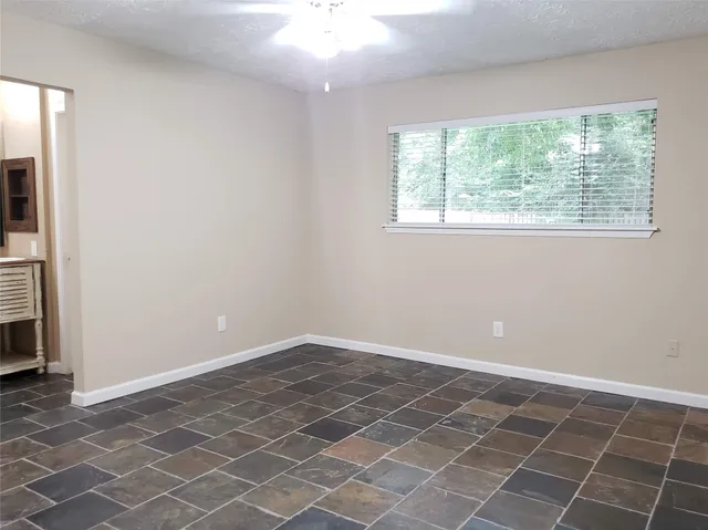 an empty room with windows