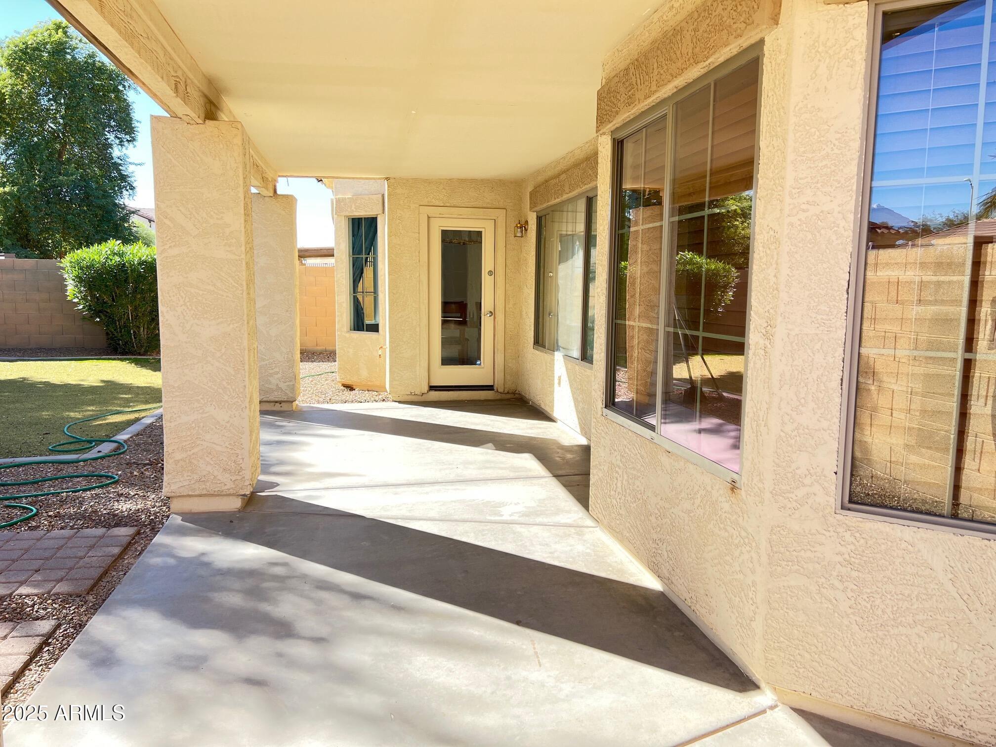 45353 West Sandhill Road Maricopa, AZ 85139 - Photo 12 of 20 a view of a house with a backyard