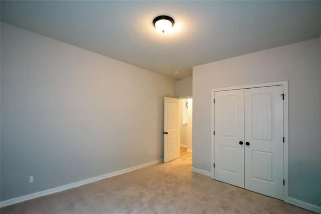 a view of a kitchen with furniture and a window