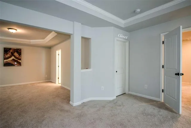 a bathroom with a tub and a window