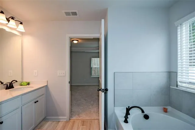 a living room with couch and a window