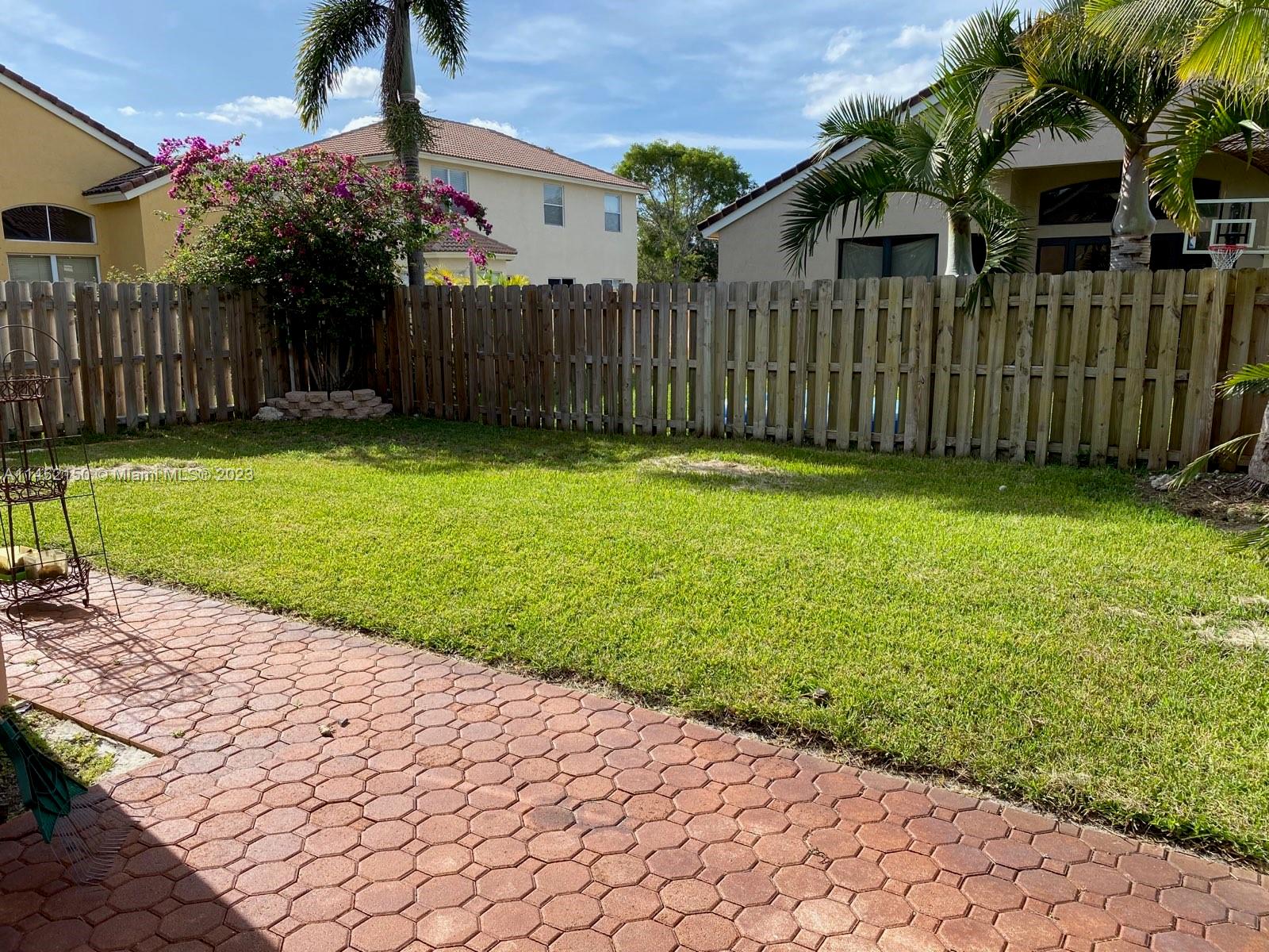 Miramar Miramar, FL 33029 - Photo 6 of 8 a front view of a house having yard