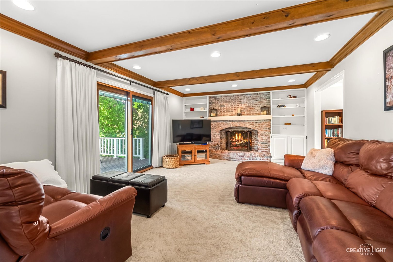 27W343 Churchill Road Winfield, IL 60190 - Photo 4 of 40 a living room with furniture and a fireplace