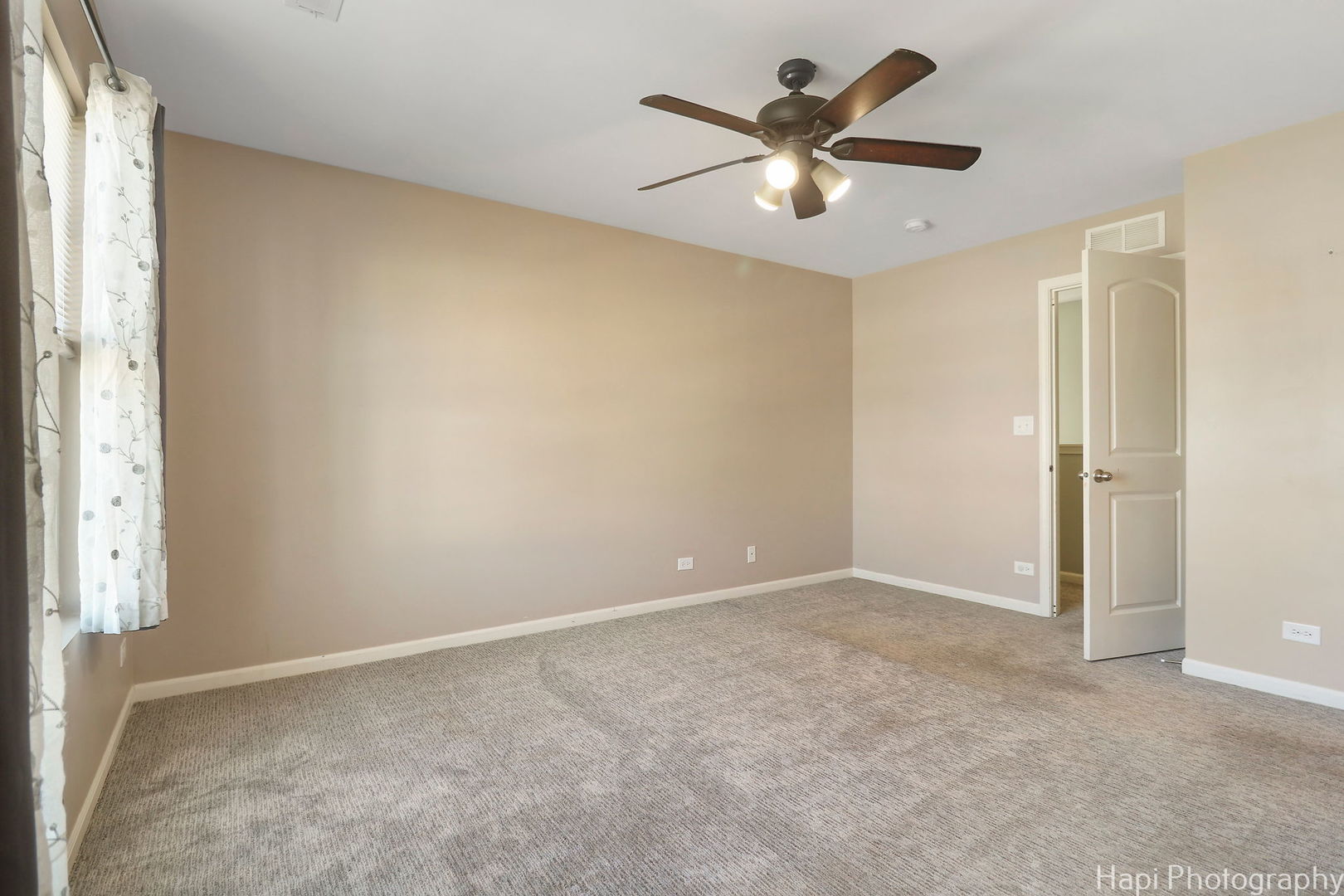 672 Anchorage Court Pingree Grove, IL 60140 - Photo 15 of 31 an empty room with closet and a ceiling fan