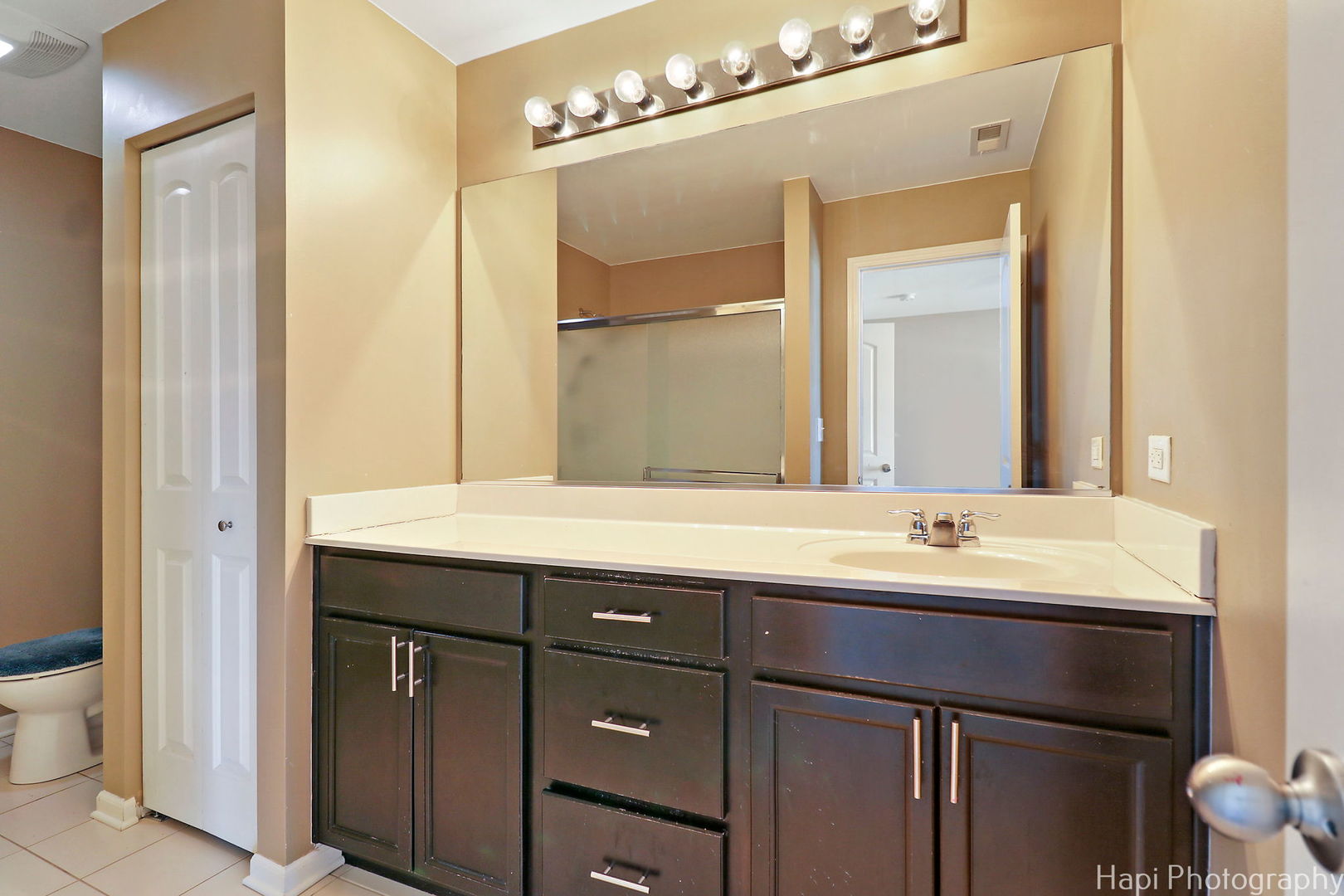 672 Anchorage Court Pingree Grove, IL 60140 - Photo 16 of 31 a bathroom with a double vanity sink and a mirror