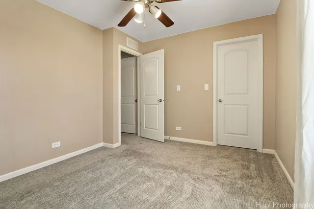 an empty room with a bathroom