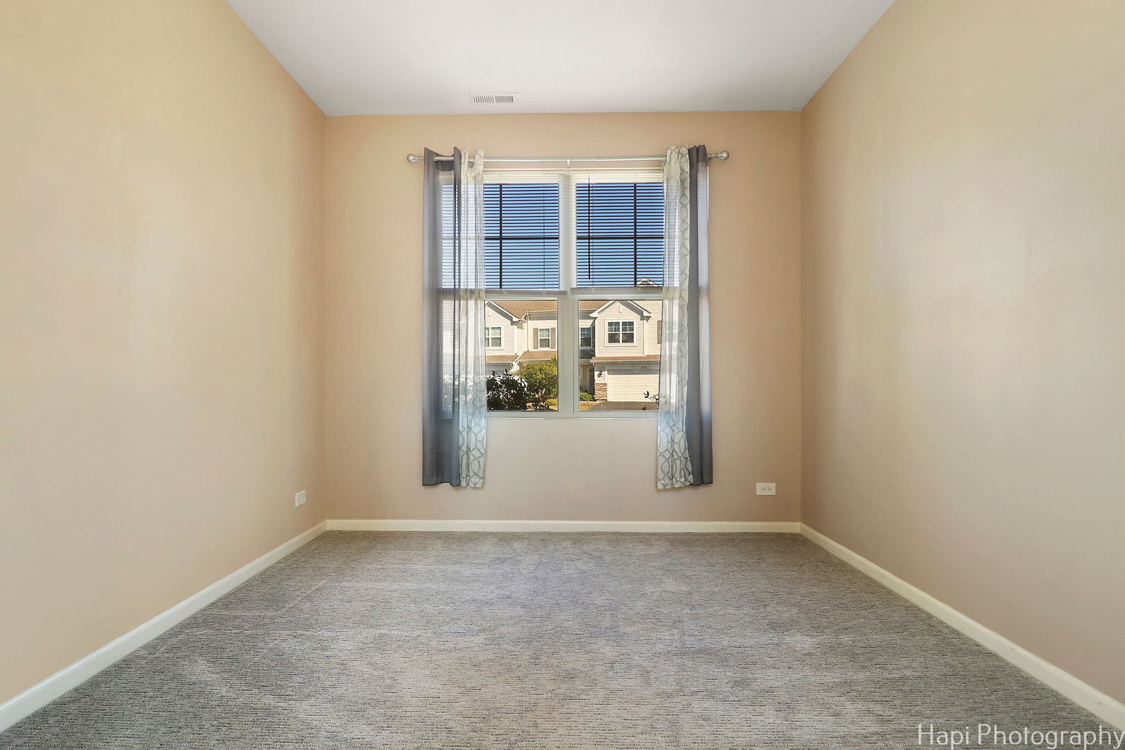 672 Anchorage Court Pingree Grove, IL 60140 - Photo 6 of 31 an empty room with windows