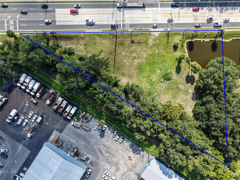 South 14th Street Leesburg, FL 34748 - Photo 4 of 11 a view of a swimming pool with a yard and plants