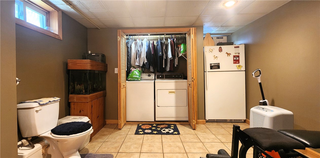 39 Hambly Road Tiverton, RI 02878 - Photo 18 of 29 half bathroom with laundry area lower level