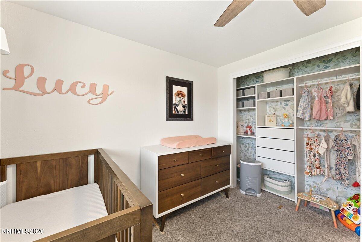 2205 Carlin Street Reno, NV 89503 - Photo 23 of 51 a view of walk in closet with clothes and shoes
