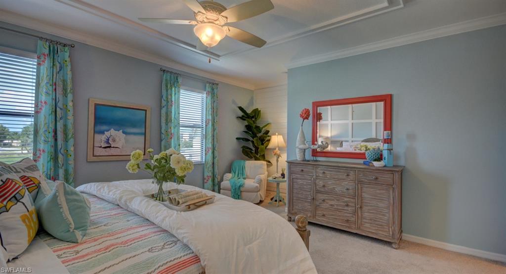 2767 Citrus Street Naples, FL 34120 - Photo 12 of 27 a bedroom with a bed and a dresser