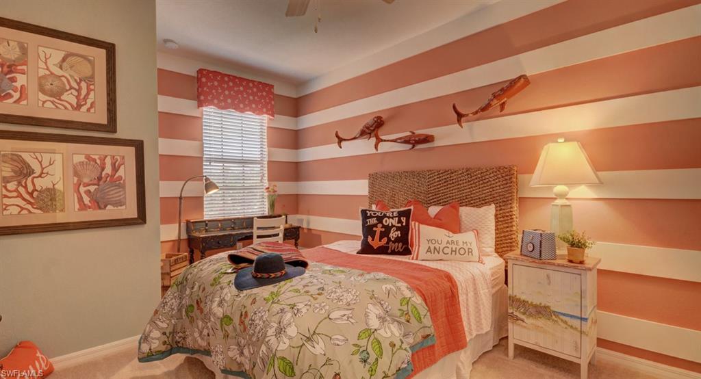 2767 Citrus Street Naples, FL 34120 - Photo 14 of 27 a bed room with a bed and a night stand