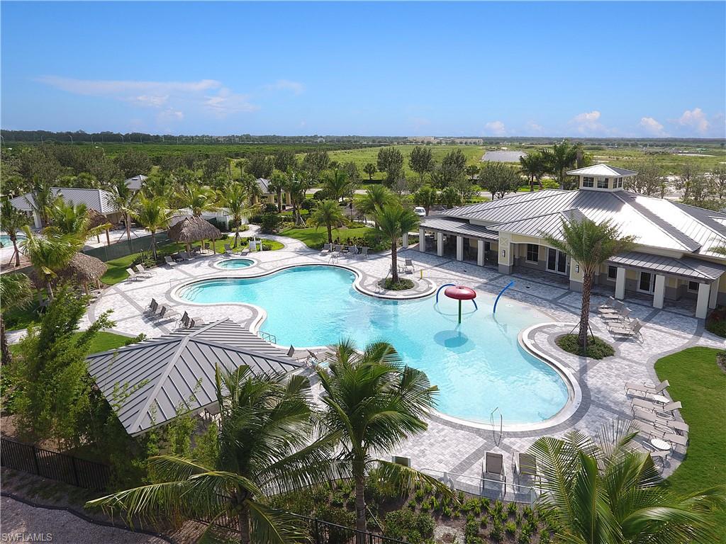 2767 Citrus Street Naples, FL 34120 - Photo 21 of 27 an aerial view of residential houses with outdoor space and lake view