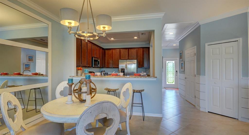 2767 Citrus Street Naples, FL 34120 - Photo 5 of 27 a view of a dining room and livingroom