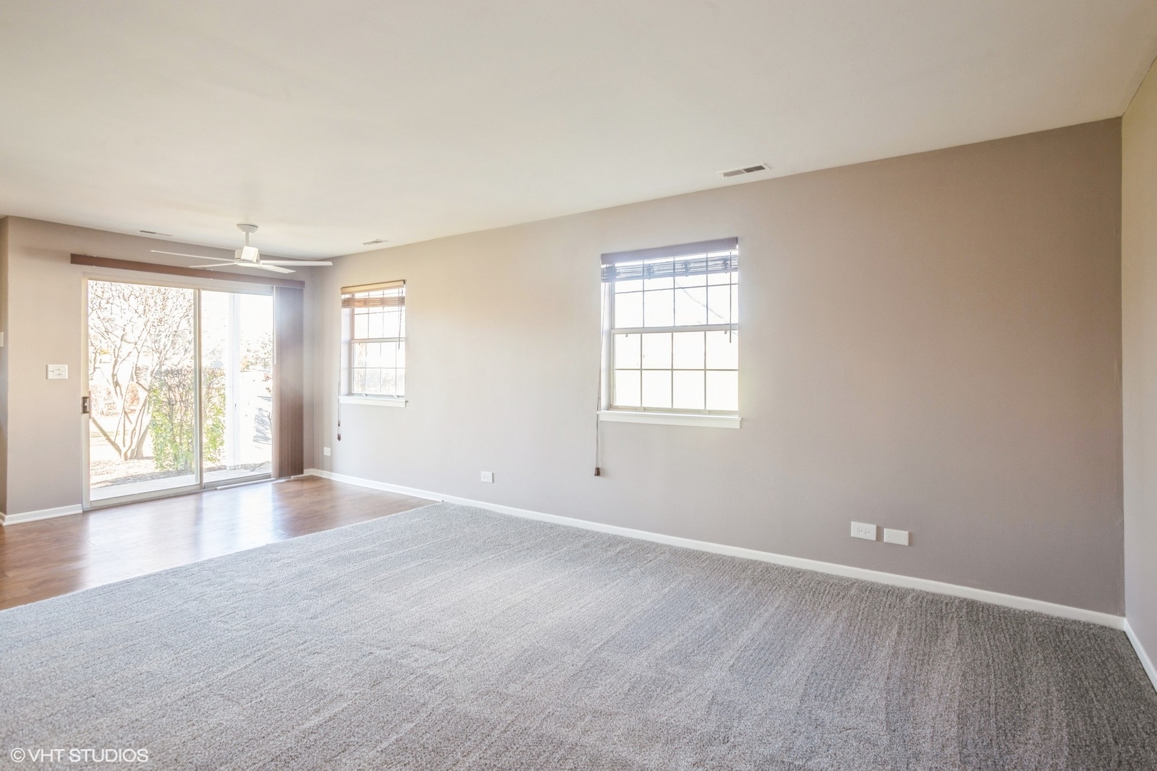 117 Gant Circle, Unit D Streamwood, IL 60107 - Photo 6 of 16 an empty room with windows