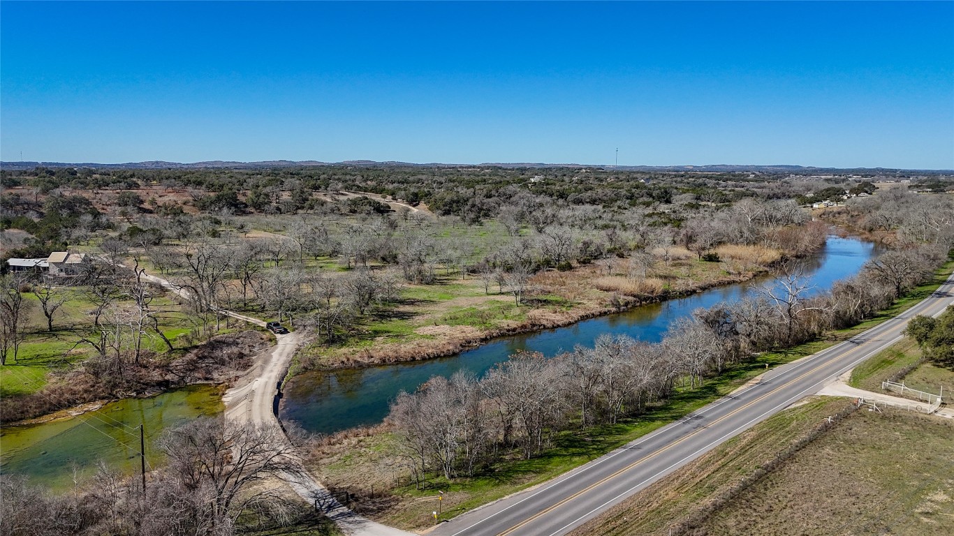 Tbd Lost Acres Loop Blanco, TX 78606 - Photo 3 of 39 a view of a city with ocean view