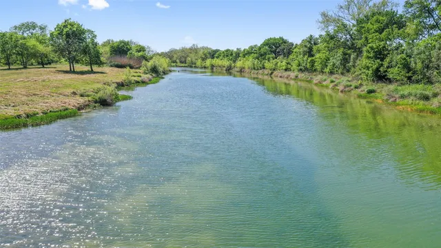 a view of a lake with outdoor space