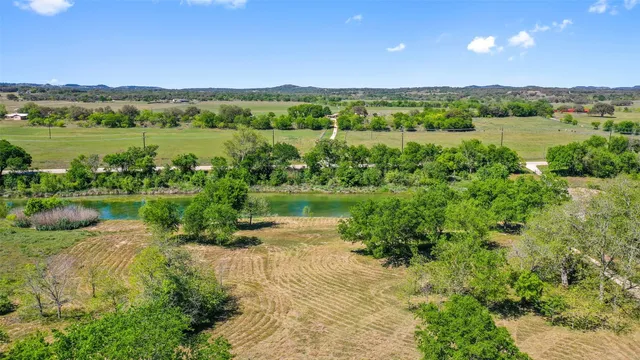 a view of lake with mountain in background
